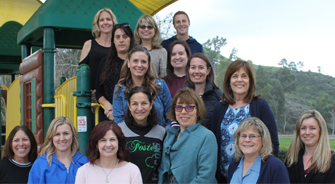 staff members on the playground