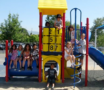 students on playground equipment